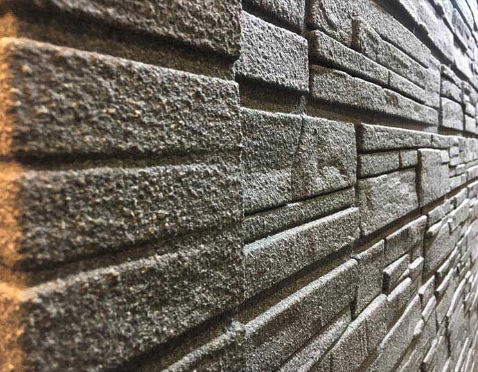 ADD STONE的亞仿石牆板是由塑膠基礎的快速安裝牆板材料，預先噴塗亞仿石漆，可以快速、簡單的創造岩石風格的牆面。