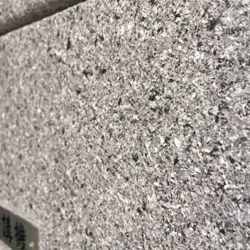 Look at the details of texture on the cover of the telecom box, this is created by ADD STONE faux-stone coating.