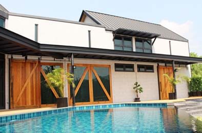Pak Chong, Thailand. This private farm creates a country style villa with ADD STONE faux-stone coating.